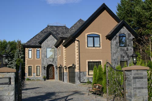 The private residence and gated driveway